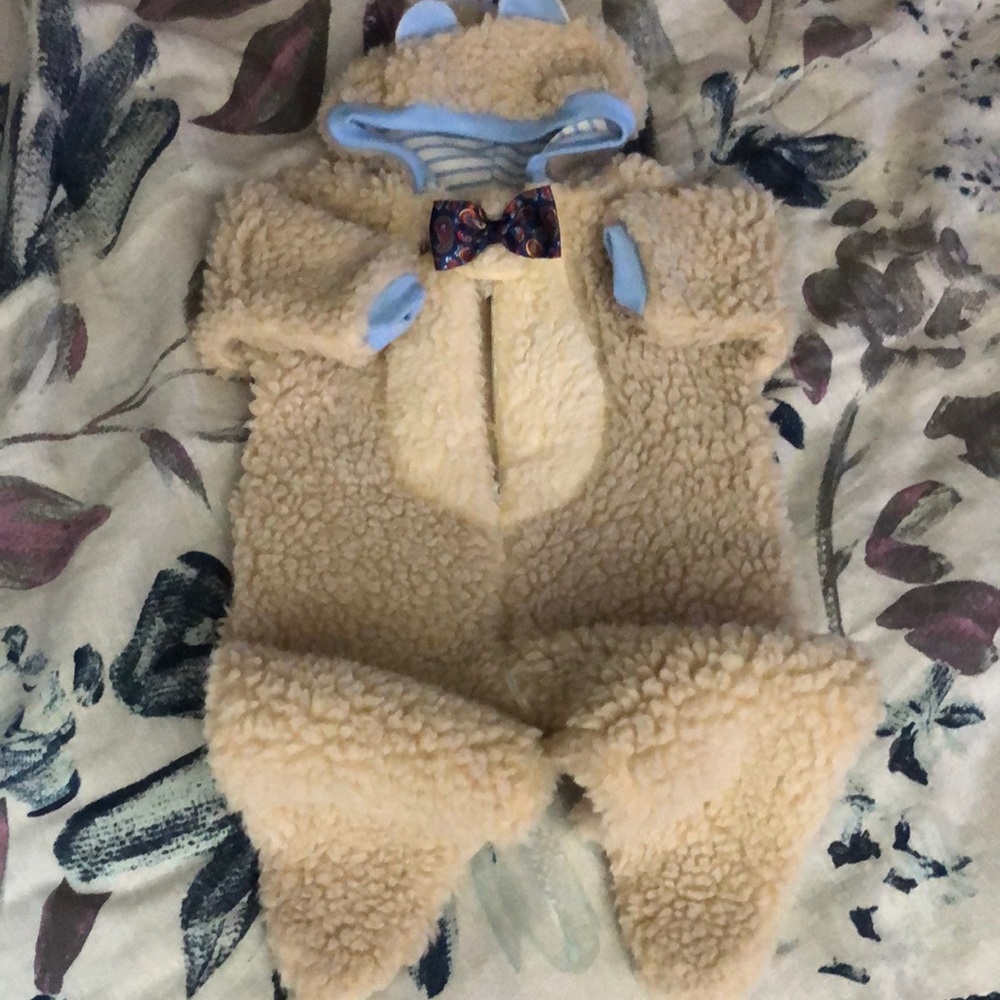 Fuzzy Cream Baby Onesie with Blue Bow Tie